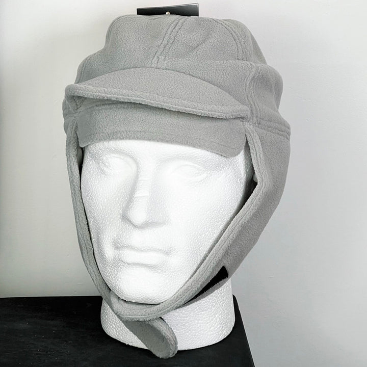 90s Deadstock Vintage Nike swoosh polar fleece flap cap hat in grey with embroidered Nike Swoosh. Velcro closure flaps. Colour: Grey Brand New with Tags  -  Size on Tag: Unisex