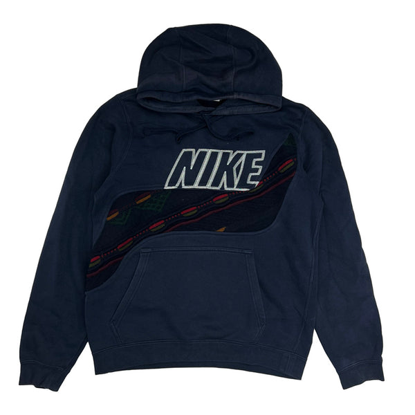 Vintage reworked Nike x COOGI Hoodie in navy blue with spellout logo to chest. Drawstrings to hood. Kangaroo pocket to front. - Colour: Navy Blue Condition: Good  - Size on Tag: Small Measurements: Pit to Pit: 21 Inches Length: 25 Inches  All our items are of vintage conditions. This means some items may show signs of minor wear. Any major defects will be pictured and/or stated in the description. We recommend to wash all vintage items before use.