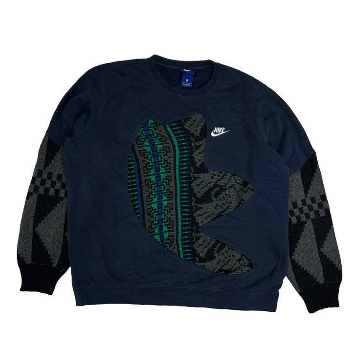Vintage reworked Nike x COOGI Sweatshirt in navy blue with spellout logo to chest. Crewneck. - Colour: Navy Blue Condition: Good  - Size on Tag: Large Measurements: Pit to Pit: 26 Inches Length: 27 Inches  All our items are of vintage conditions. This means some items may show signs of minor wear. Any major defects will be pictured and/or stated in the description. We recommend to wash all vintage items before use.