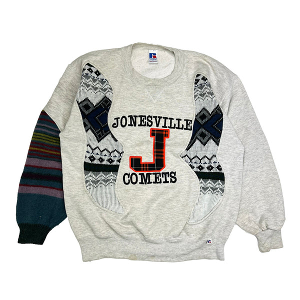 Vintage reworked Jonesville Comets x COOGI Sweatshirt in grey with large spellout to chest. Crewneck. Russell Athletic collab. - Colour: Grey Condition: Good  - Size on Tag: Large Measurements: Pit to Pit: 23 Inches Length: 25 Inches  All our items are of vintage conditions. This means some items may show signs of minor wear. Any major defects will be pictured and/or stated in the description. We recommend to wash all vintage items before use.