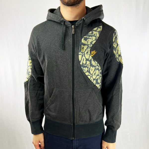 Vintage reworked Nike x COOGI Hoodie in grey with spellout logo to chest. Drawstrings to hood. Full zip closure. Pockets to front. - Colour: Grey Condition: Good  - Size on Tag: Small Measurements: Pit to Pit: 21 Inches Length: 25 Inches  All our items are of vintage conditions. This means some items may show signs of minor wear. Any major defects will be pictured and/or stated in the description. We recommend to wash all vintage items before use.