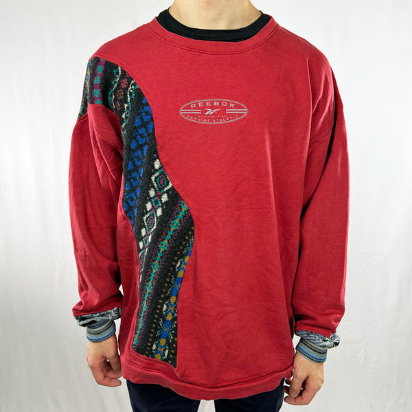 Vintage reworked Reebok x COOGI Sweatshirt in red with logo to chest. Crewneck. - Colour: Red Condition: Good  - Size on Tag: 2XL (more like a L/XL) Measurements: Pit to Pit: 25 Inches Length: 28 Inches  All our items are of vintage conditions. This means some items may show signs of minor wear. Any major defects will be pictured and/or stated in the description. We recommend to wash all vintage items before use.
