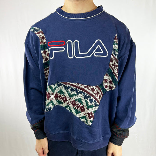 Vintage reworked Fila x COOGI Sweatshirt in navy blue with large spellout logo to chest. Crewneck. - Colour: Navy Condition: Good  - Size on Tag: Large Measurements: Pit to Pit: 28 Inches Length: 25.5 Inches  All our items are of vintage conditions. This means some items may show signs of minor wear. Any major defects will be pictured and/or stated in the description. We recommend to wash all vintage items before use.