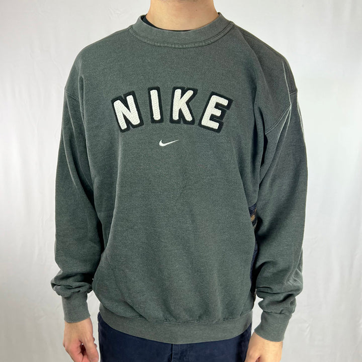 Vintage reworked Nike x COOGI Sweatshirt in grey with large spellout logo to chest. Crewneck. - Colour: Grey Condition: Good  - Size on Tag: Large Measurements: Pit to Pit: 24.5 Inches Length: 27.5 Inches  All our items are of vintage conditions. This means some items may show signs of minor wear. Any major defects will be pictured and/or stated in the description. We recommend to wash all vintage items before use.