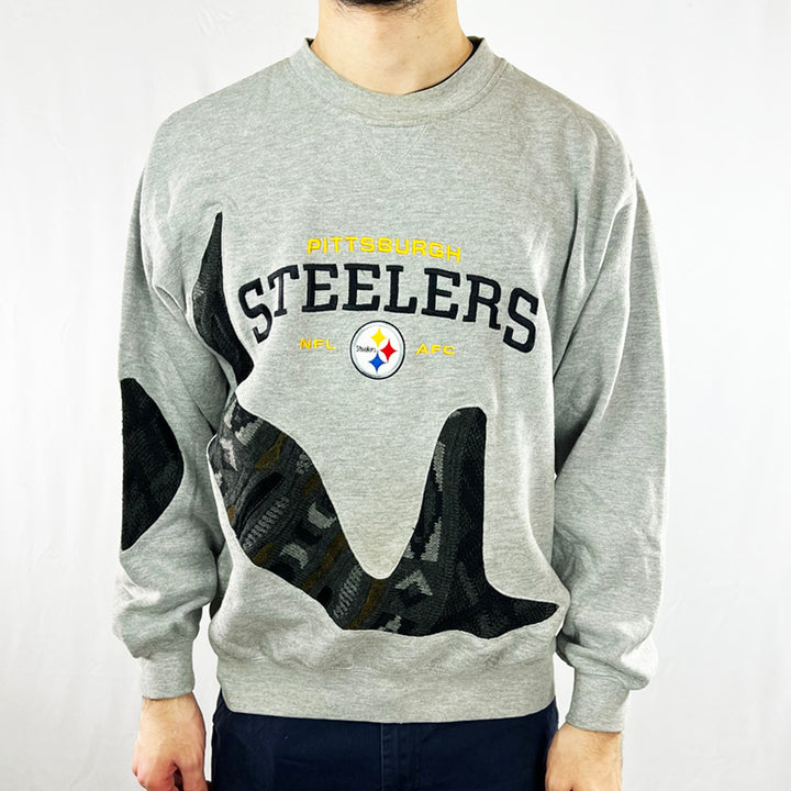 Vintage reworked NFL Pittsburgh Steelers x COOGI Sweatshirt in grey with large spellout to chest. Crewneck. - Colour: Grey Condition: Good  - Size on Tag: Medium Measurements: Pit to Pit: 23.5 Inches Length: 26 Inches