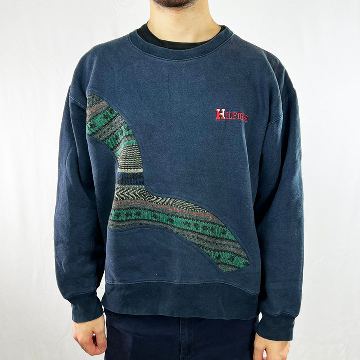 Navy Blue 90s style Feel timeless fashion with this reworked Tommy Hilfiger x COOGI Sweatshirt! Featuring a classic crewneck style in the iconic navy blue of the 90s, it's sure to have you looking like the talk of the town. Own some originality and make sure you stand out from the crowd! Condition: Good  - Size on Tag: Large Measurements: Pit to Pit: 22 Inches Length: 25 Inches