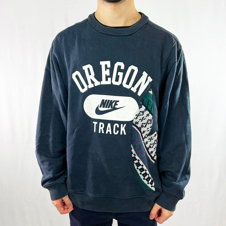 Vintage reworked Nike x COOGI Sweatshirt in navy blue with large spellout logo to chest. Crewneck. - Colour: Navy Blue Condition: Good  - Size on Tag: Large Measurements: Pit to Pit: 24 Inches Length: 27 Inches