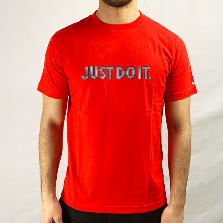 2002 Deadstock Vintage Nike Just Do It T-shirt in red with Nike JUST DO IT spellout across chest with embroidered swoosh to sleeve. Colour: Red Brand New with Tags _ Size on Tag: Medium Measurements: Pit to Pit: 19.5 Inches Length: 27 Inches  All our items are of vintage conditions. This means some items may show signs of minor wear. Any major defects will be pictured and stated in the description