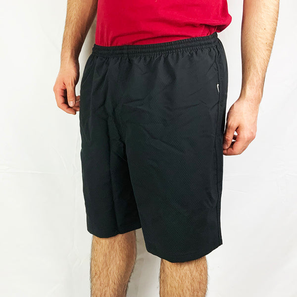 2004 Deadstock Vintage Nike Dri-Fit shorts in black with Nike branding to side. Adjustable drawstring to waist. Zip pocket on side. Colour: Black  Brand New with Tags  -  Size on Tag: Large  Measurements:  Length: 19.5 Inches  Waist: GB 34/36  All our items are of vintage conditions. This means some items may show signs of minor wear. Any major defects will be pictured and stated in the description