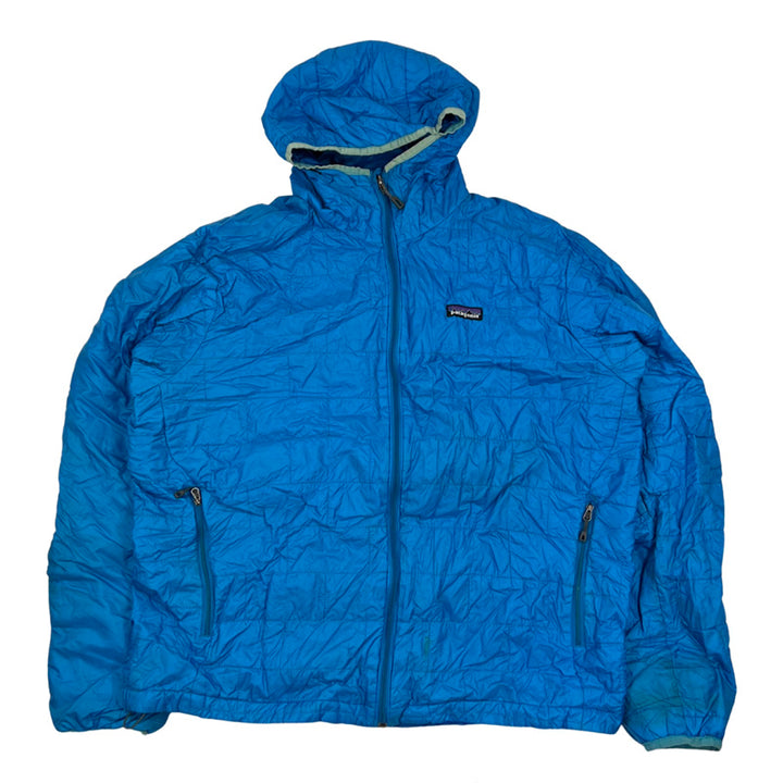 Y2K Vintage Patagonia puffer jacket in blue. Patagonia branding to chest. Zip pockets to front. Zip closure to jacket. Lightweight packable jacket. - Colour: Blue Condition: Good - Size on Tag: Large Measurements: Pit to Pit: 24 Inches Length: 26.5 Inches